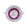 Cluster of diamonds & invisible set ruby ring.